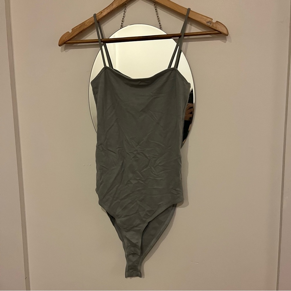 Topshop tank bodysuit in a grey ish blue color size US 4 lightly worn